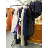A quantity of ladies clothing, to include a tweed blazer, ladies over coat, faux fur coat, navy blue