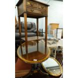 An oval top coffee table, a gilt framed wall mirror, and a two tier side table. (3)