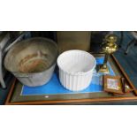 A brass oil lamp base, print of a spitfire, ceramic jardiniere, prints relating to uphill Lincoln, e