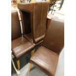Four leatherette dining chairs, each on square tapering legs.