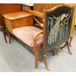 A telephone table, and an oak framed firescreen, decorated to the centre with a peacock. The upholst