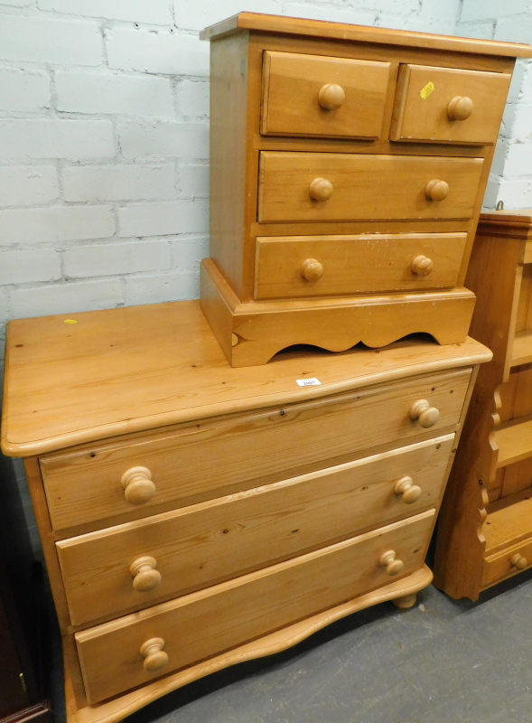 A pine chest of three long drawers, and a further small/ apprentice type chest of two short and two