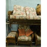 A wicker conservatory suite, comprising two seater chair, armchairs, etc. (a quantity)