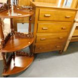 A mahogany three tier what-not, and a chest of drawers.