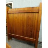 A pair of pine privacy screens, possibly from a church or chapel.