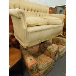 A two seater sofa, and two armchairs in floral fabric. The upholstery in this lot does not comply wi