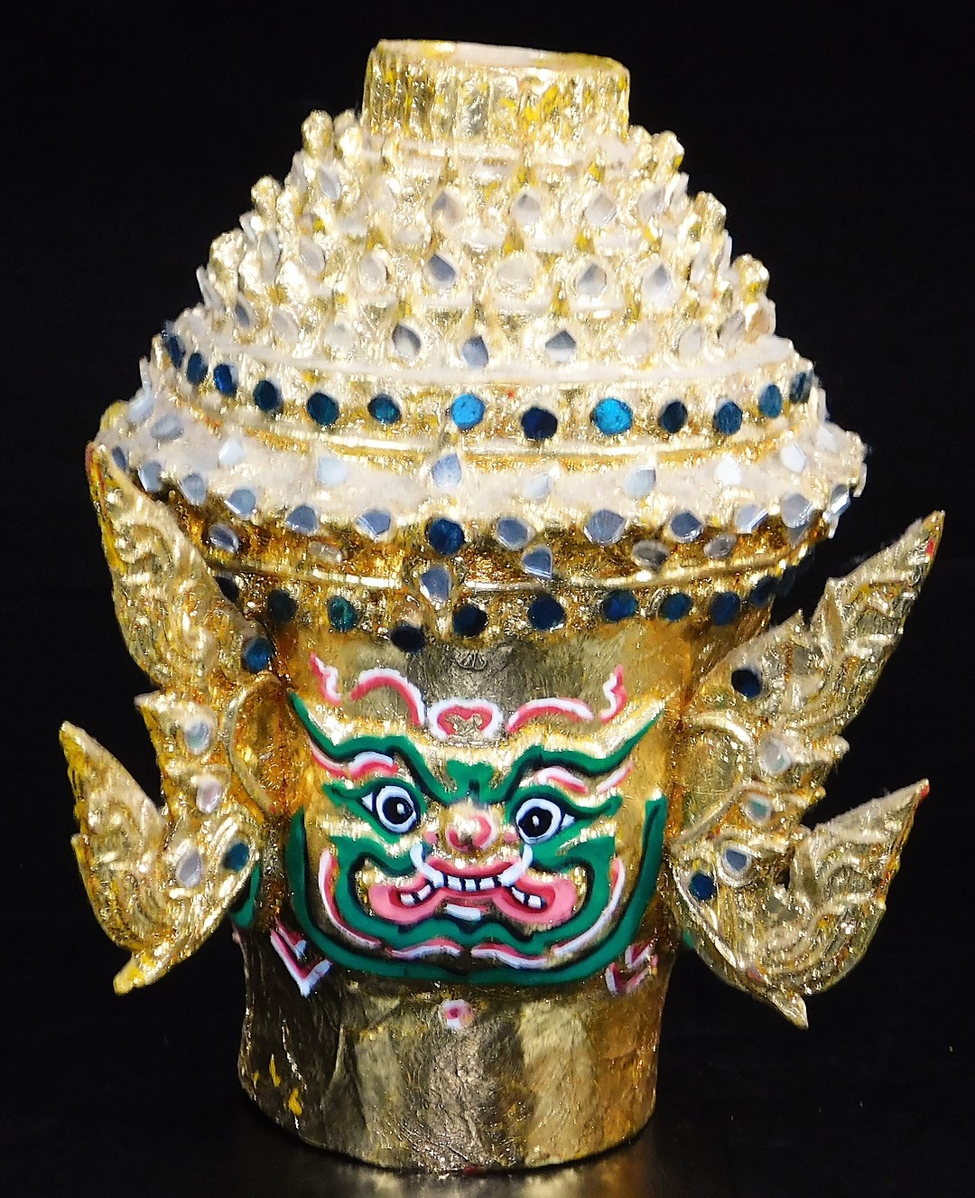 A Thai face mask, heavily decorated with mirrored glass sections set with tusks and with fierce - Image 8 of 16