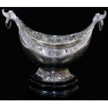 An early 20thC Indian ceremonial bowl, of shaped ellipse form with heavily cast ring handles, and