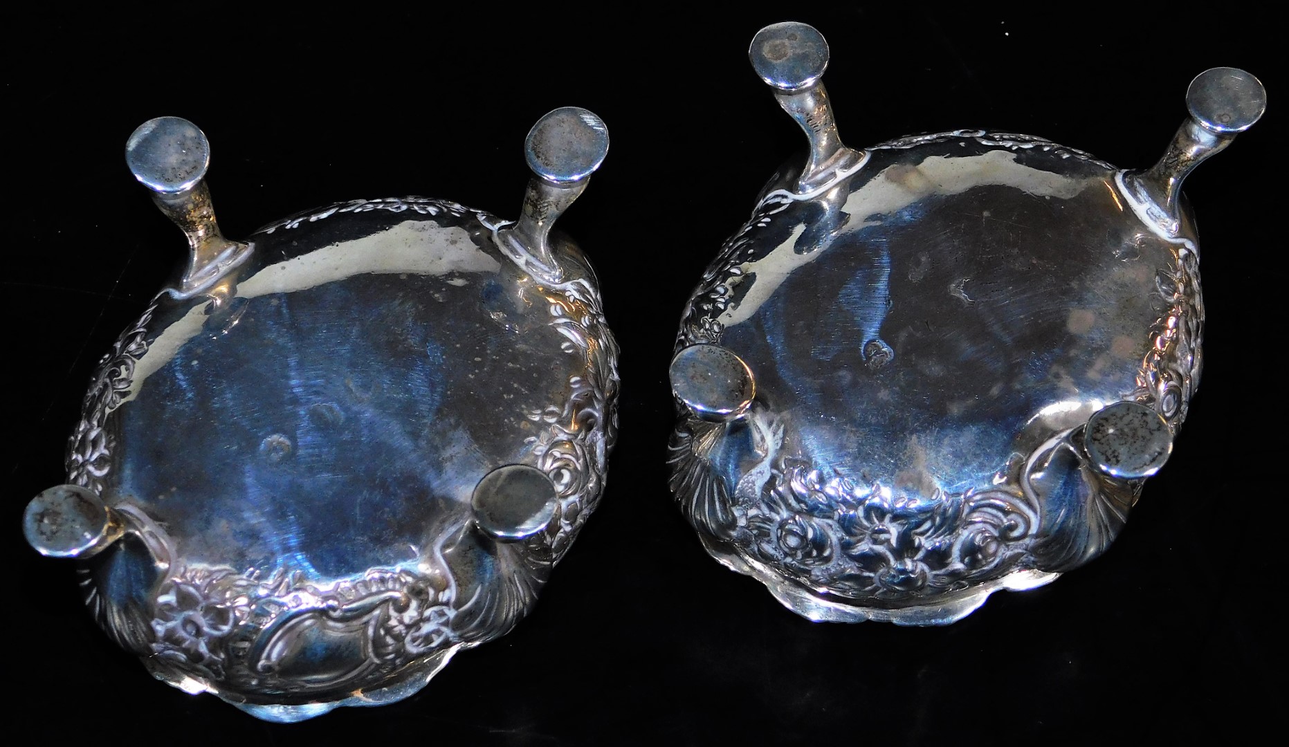 A pair of late 18thC silver salts, of oval form, heavily repousse decorated with a repeat floral - Image 3 of 3