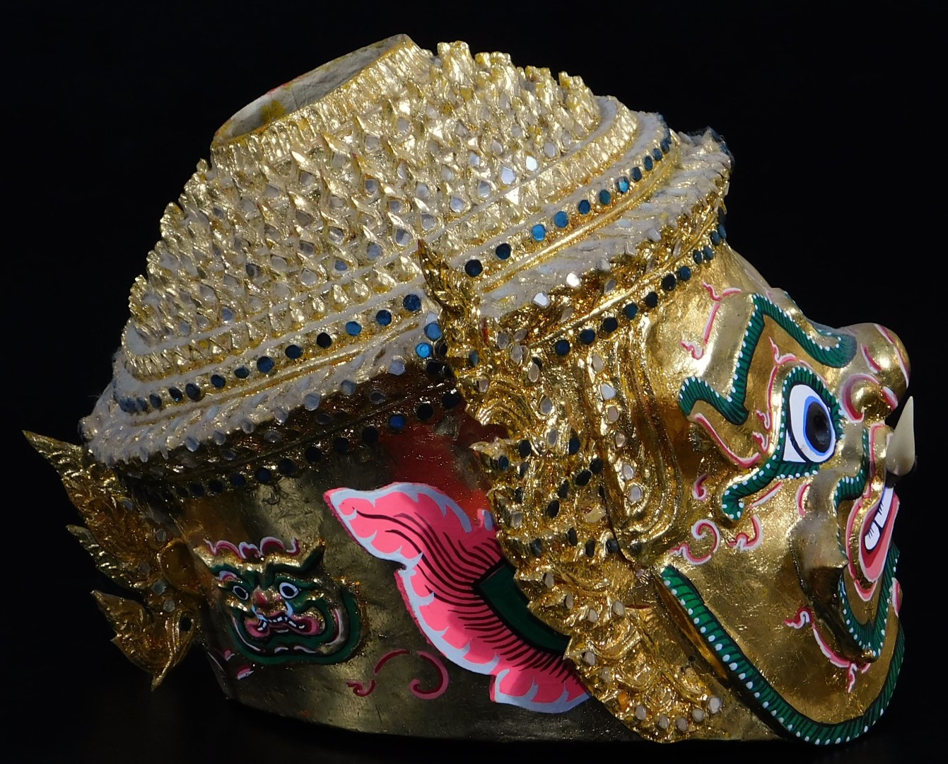 A Thai face mask, heavily decorated with mirrored glass sections set with tusks and with fierce - Image 5 of 16