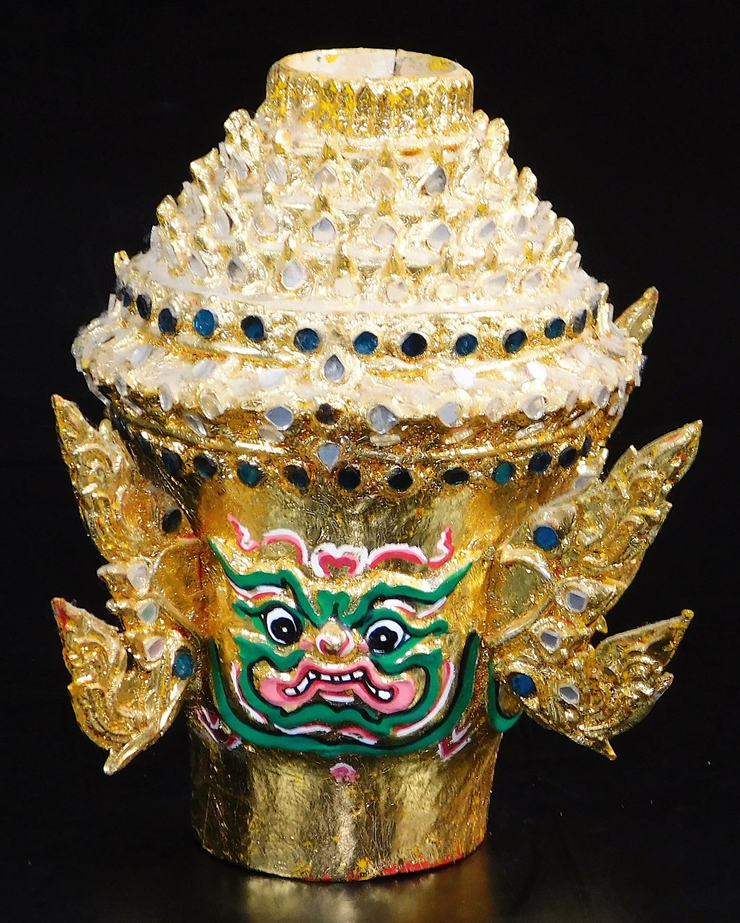 A Thai face mask, heavily decorated with mirrored glass sections set with tusks and with fierce - Image 9 of 16