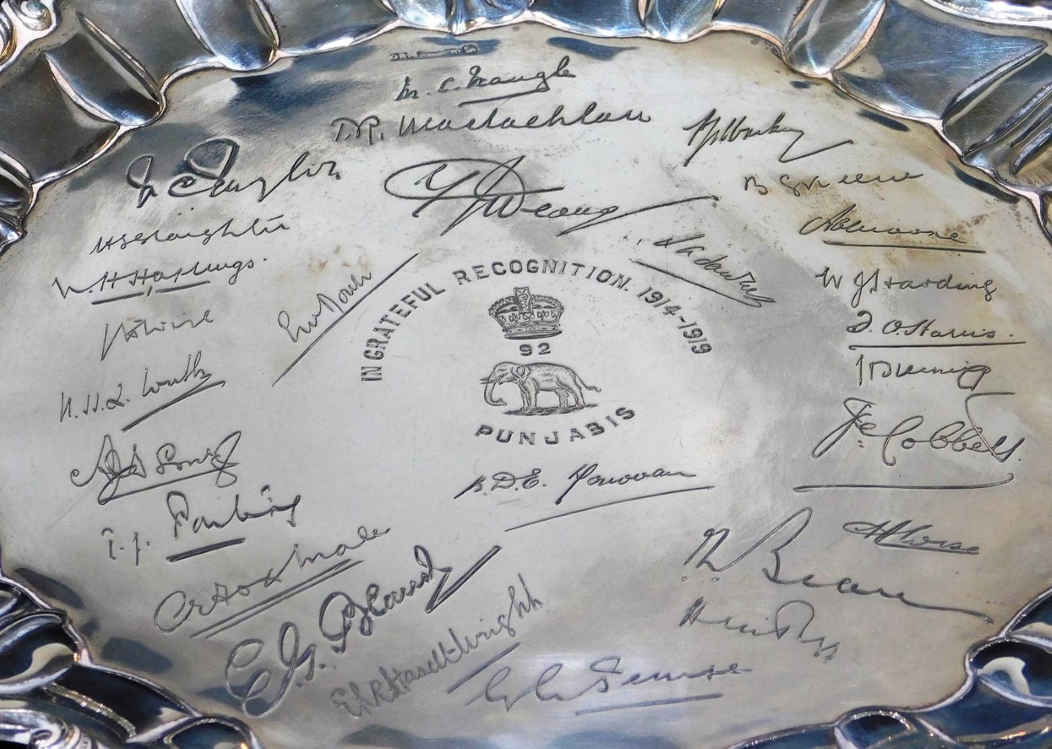 A ceremonial Indian salver, with a pie crust and heart shaped part gadrooned border, with various - Image 2 of 3