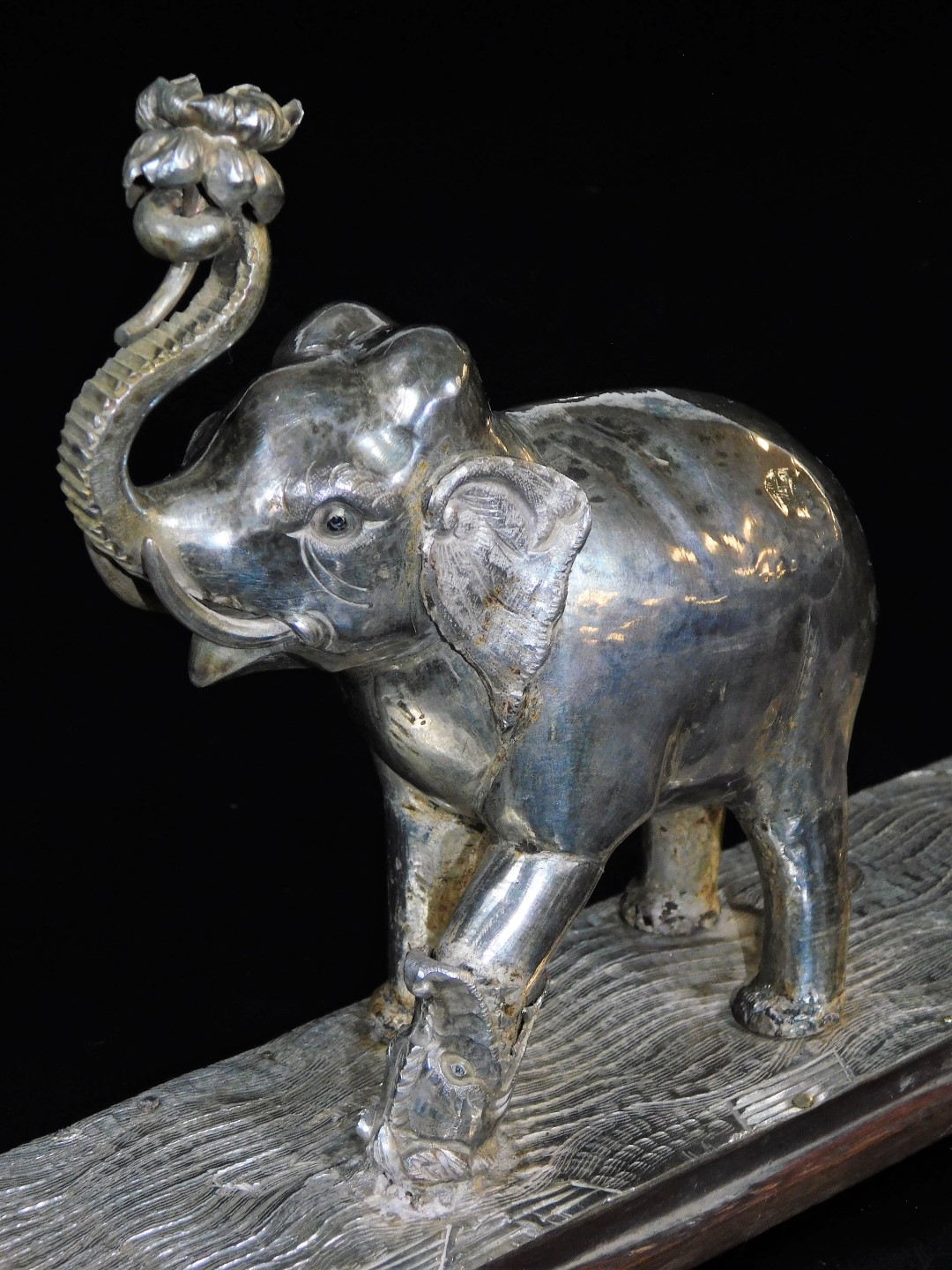 An early 20thC ceremonial figure group of an elephant being attacked by a wild beast, with trunk - Image 6 of 6