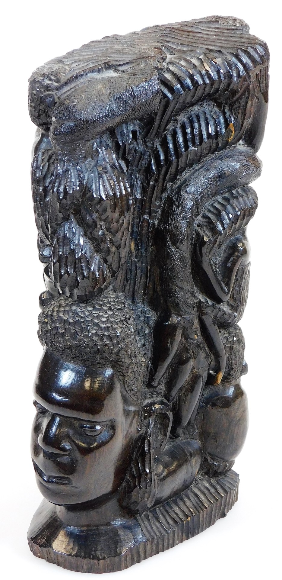 A heavily carved African tribal style figure, with foot raised on a canted base, unmarked, 32cm - Image 2 of 11