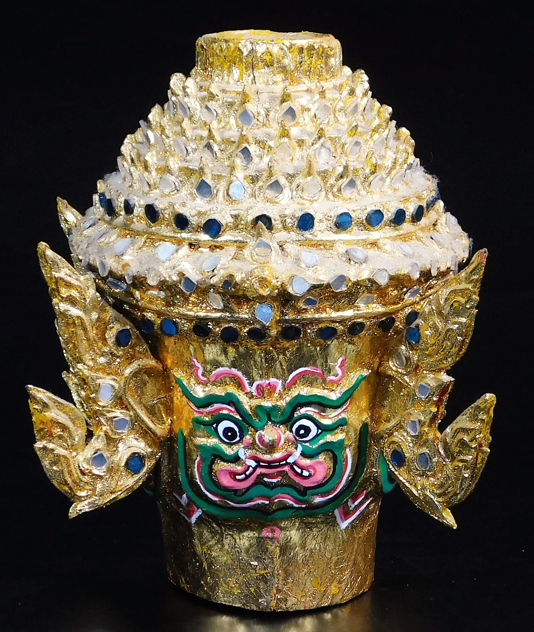 A Thai face mask, heavily decorated with mirrored glass sections set with tusks and with fierce - Image 7 of 16