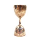 An Edward VII silver double egg cup, of single handled double sized form, presentation engraved,