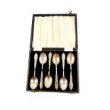 A set of six silver coffee spoons, with fancy terminals, cased, Adie Bros, Birmingham 1962, 2.70oz.