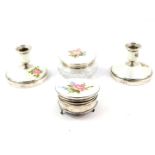 A cut glass silver and guilloche enamel four piece dressing table set, painted with roses against