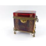 A Moser late 19thC ruby glass casket, with brass overlay, enamel decorated with floral motifs and