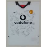 A Manchester Utd Vodafone white football shirt, bearing various signatures c2002/2003, framed and