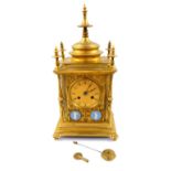 A Howell James & Company brass cased mantel clock, circular dial with engine turned decoration,
