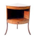 A 19thC mahogany bow front corner washstand, with plain top and drawer to centre shelf, on splay