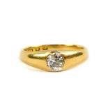 An 18ct gold and diamond solitaire ring, set with a rose cut diamond, approx 1/2ct, size R, 5.4g.