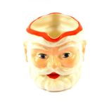 A Sadler Birds Custard Santa Claus jug, printed mark, 11cm high.