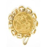 A Queen Victorian young head full gold sovereign 1879, in a yellow metal pendant mount, 10.0g all