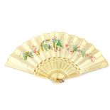 A Continental late 19thC ivory and silk fan, painted with flowers, 23cm wide.