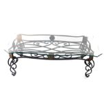 A modern wrought iron coffee table, with shaped bevelled serpentine glass top, 130cm x 72cm.