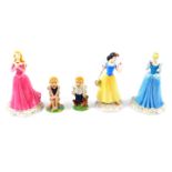 Three Royal Doulton Disney Princesses figures, comprising Sleeping Beauty, Snow White, and