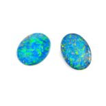 A pair of opal doublets.
