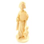 A Japanese Tokyo School ivory okimono, of a geisha with fan, child and toy, signed Kosshi (?), to