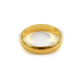 An 18ct gold wedding band, size L, 2.6g.