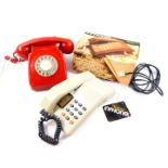 A British Telecom red dial telephone, TELE 8746F, together with a British Telecom Inphone, ice grey,