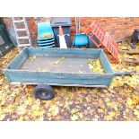 A wooden framed two wheeled trailer, 91cm wide, 186cm deep.