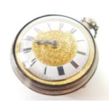 A George IV silver pair cased pocket watch, open faced, key wind, gilt and enamel dial bearing Roman
