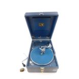 An HMV blue cased table top gramophone, 29cm wide, 41cm deep.