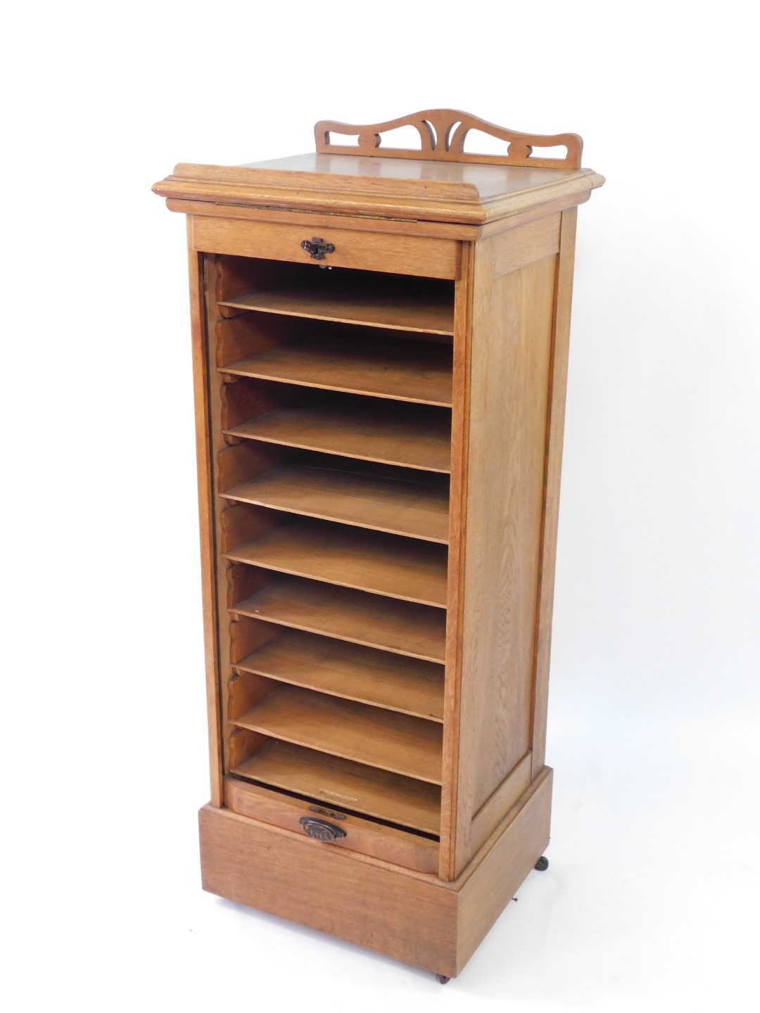 A Victorian oak tambour fronted clerk's desk, with a hinged lectern top, over nine sliding trays, - Image 2 of 4