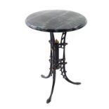 A Victorian Aesthetic Movement cast iron table base, with parcel gilt black painted base, on three