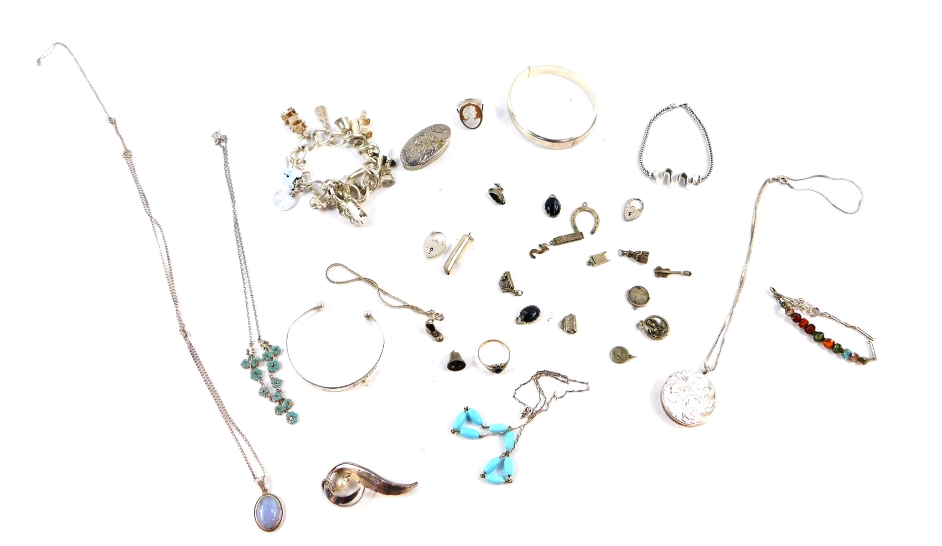 Silver and gem set jewellery, including bangles and bracelets, a charm bracelet, rings, and a