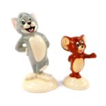 A pair of Beswick pottery figures modelled as Tom & Jerry, printed marks.