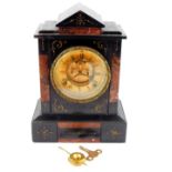 A Victorian slate and marble mantel clock, brass dial with chapter ring bearing Roman numerals,
