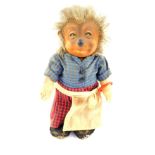 A Steiff 1960's Micki figure, of a hedgehog wearing a blue chequered top and red chequered trousers,
