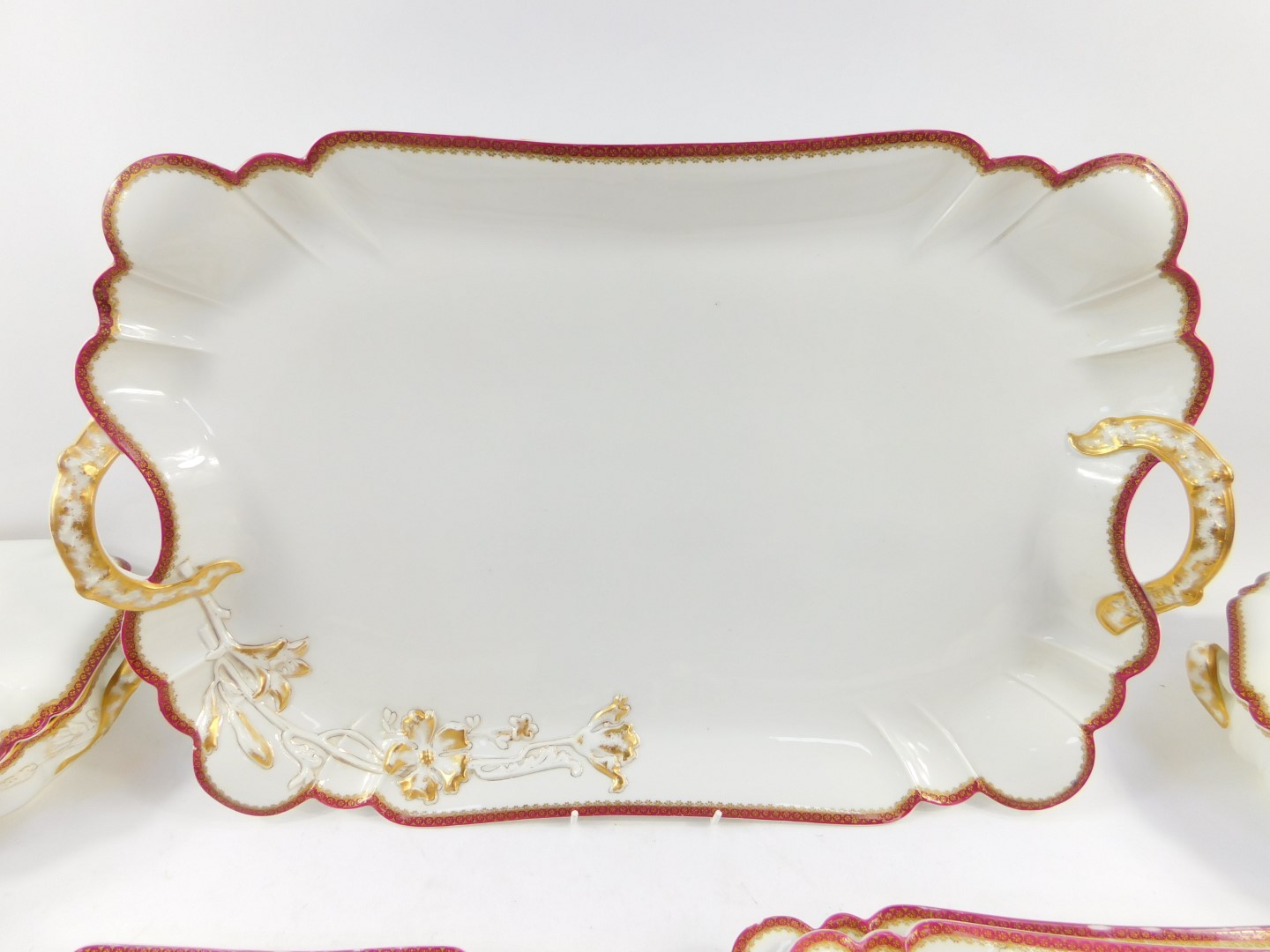 A Havilland Limoges porcelain part dinner service, moulded and gilt heightened with a floral - Image 2 of 3