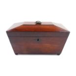 A Regency mahogany sarcophagus form tea caddy, opening to reveal two compartments, flanking a mixing