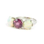 An amethyst and opal three stone ring, set in white metal, size L, 2.6g.