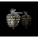 A pair of cut glass bag chandeliers, with brilliant cut drops, 32cm high, 19cm diameter.