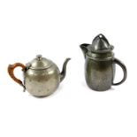 A Liberty & Co Tudric pewter jug, with a hinged lid, No 0232, impressed marks, 18.5cm high.,